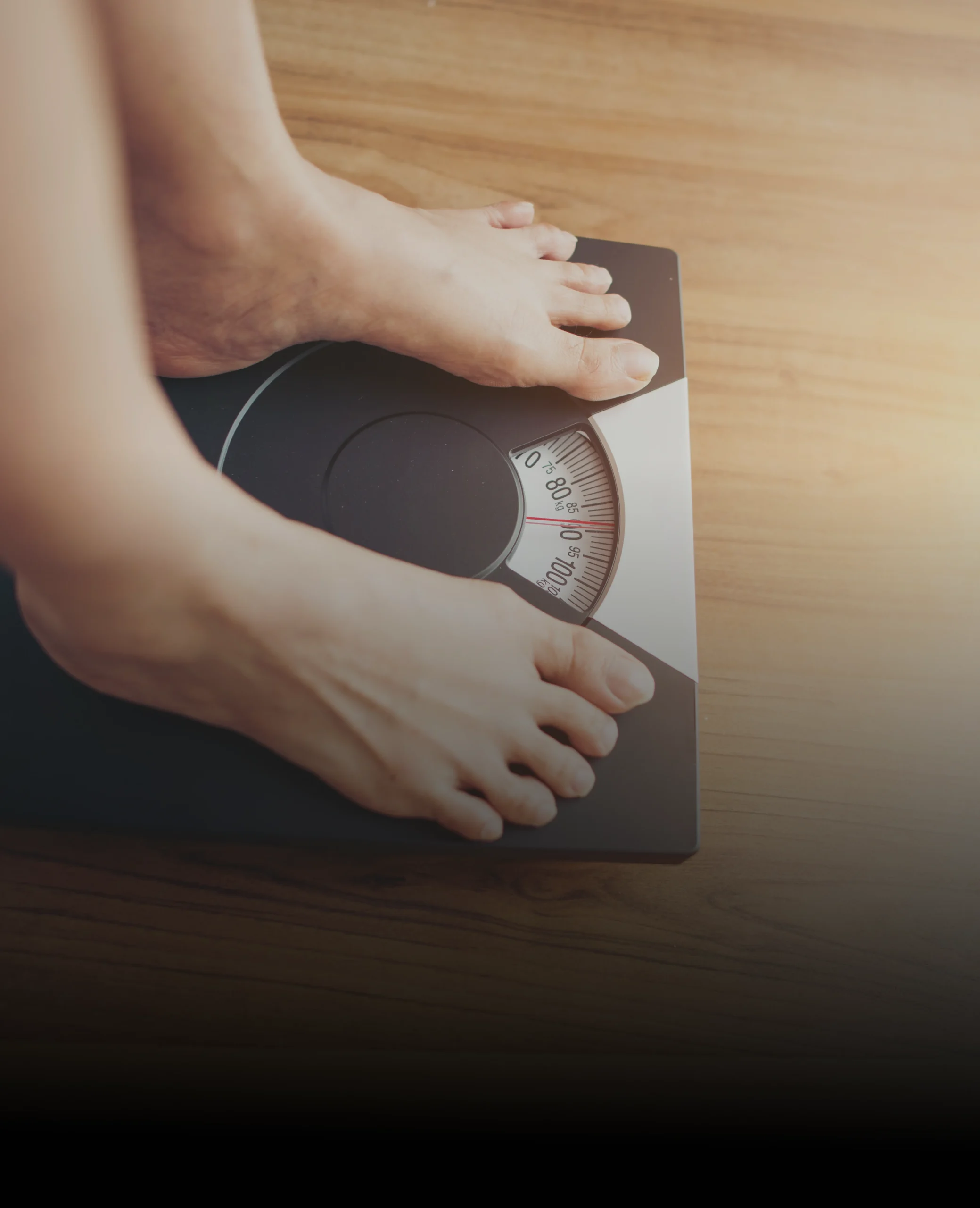 feet on a measuring scale